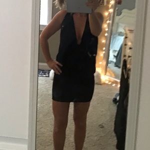 Very sexy little black dress. NWT. Halter top mini